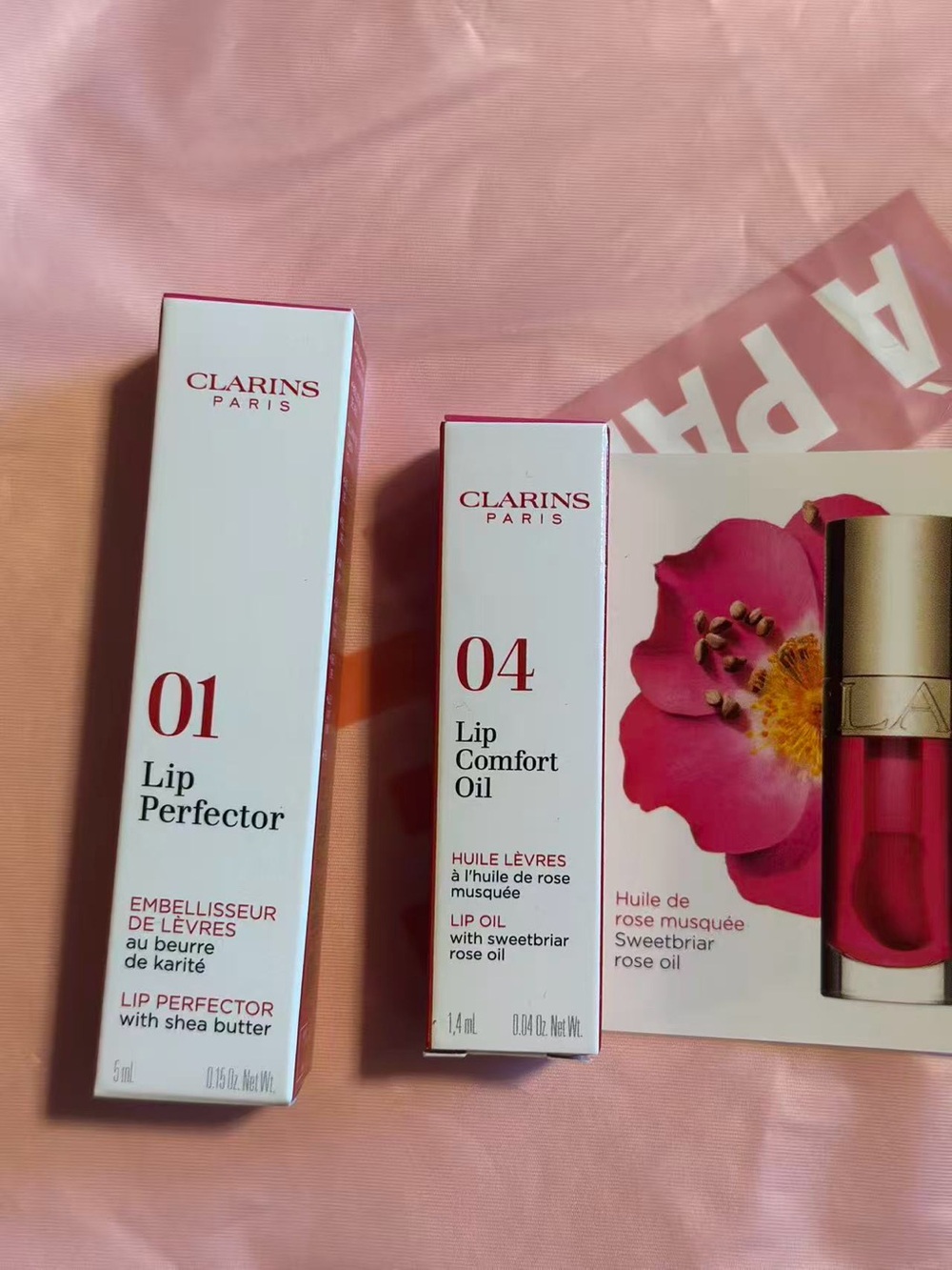 Clarins Lip Perfector 01 & Lip Comfort Oil 04 — Pink